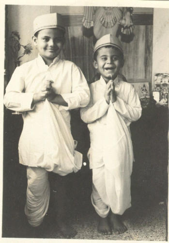 Dressed in the traditional attire of a cloth merchants. The family business was cloth hence the name Kapadia.Lt. Nawang is to the right in both the pictures