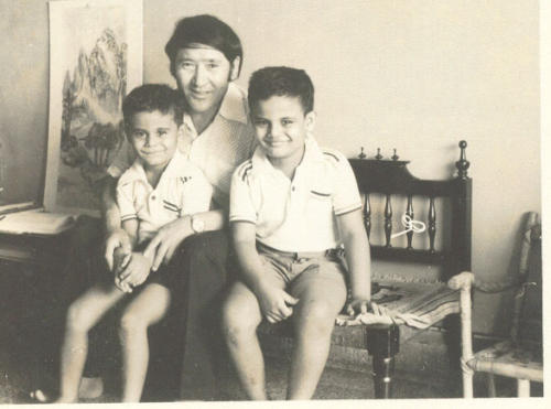 With Nawang Gombu, who has climbed Mt. Everst 5 times and Nawang was named after him. Nawang is on the left in his lap